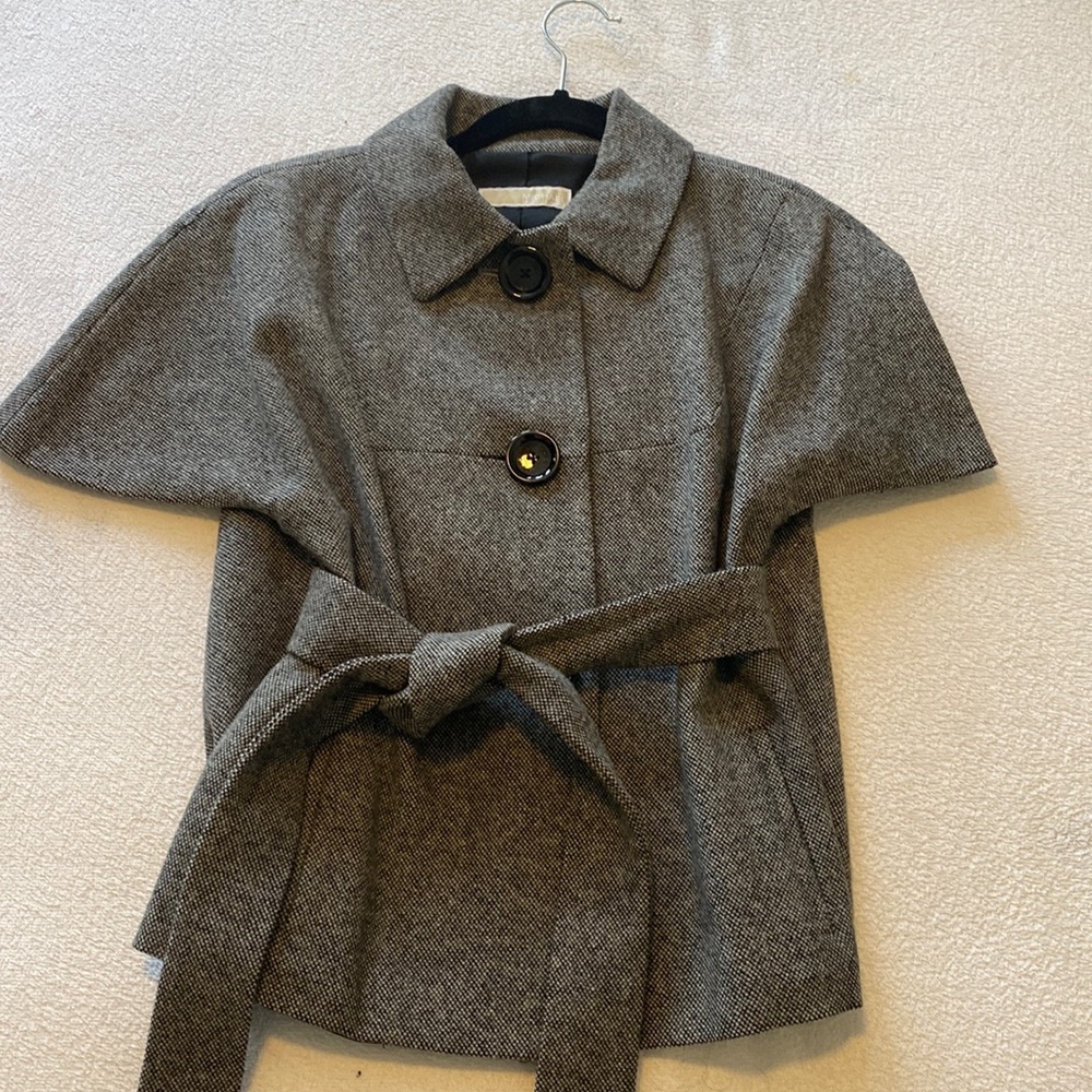 Michael Kors jacket. No size listed. Estimate size small or 4-6. Lined. Pockets.